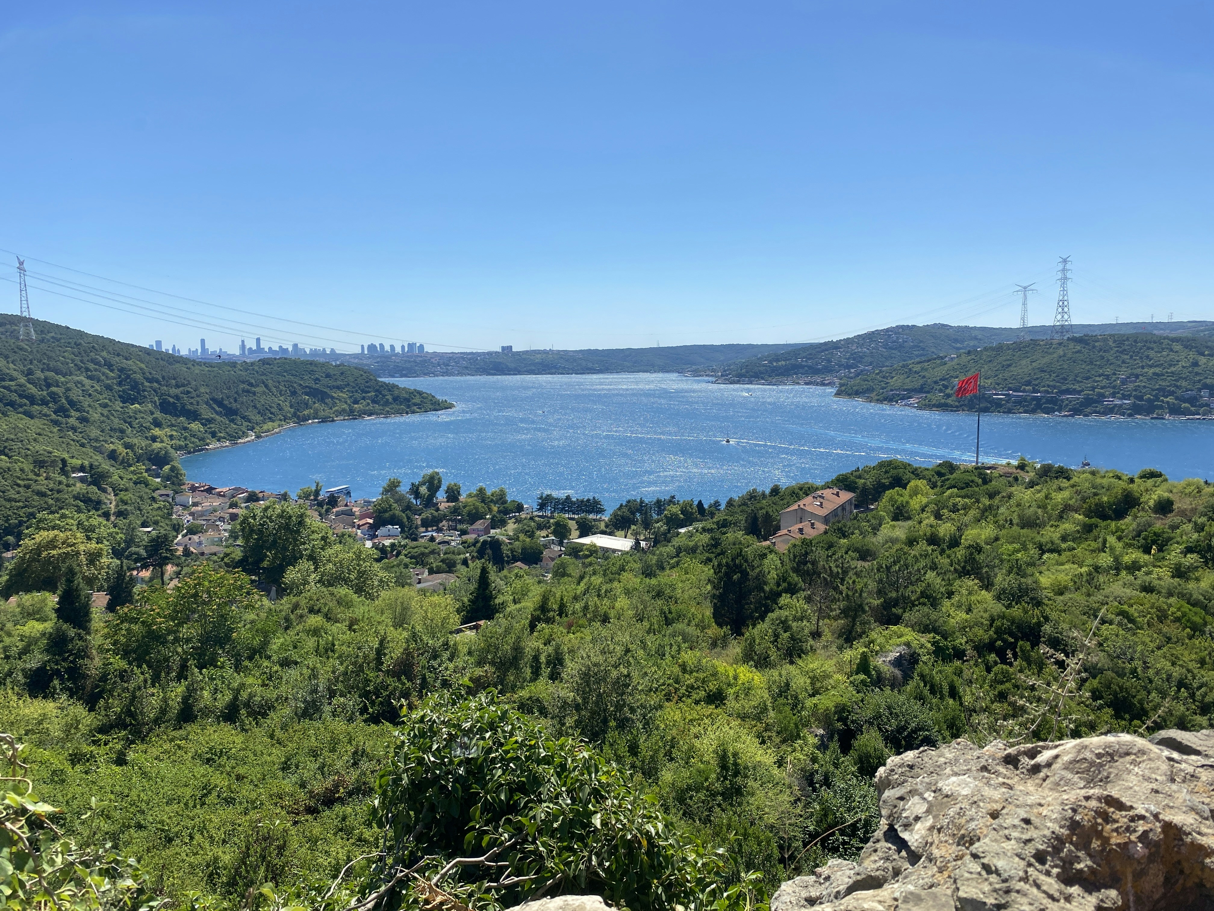 a view of a lake from a hill top