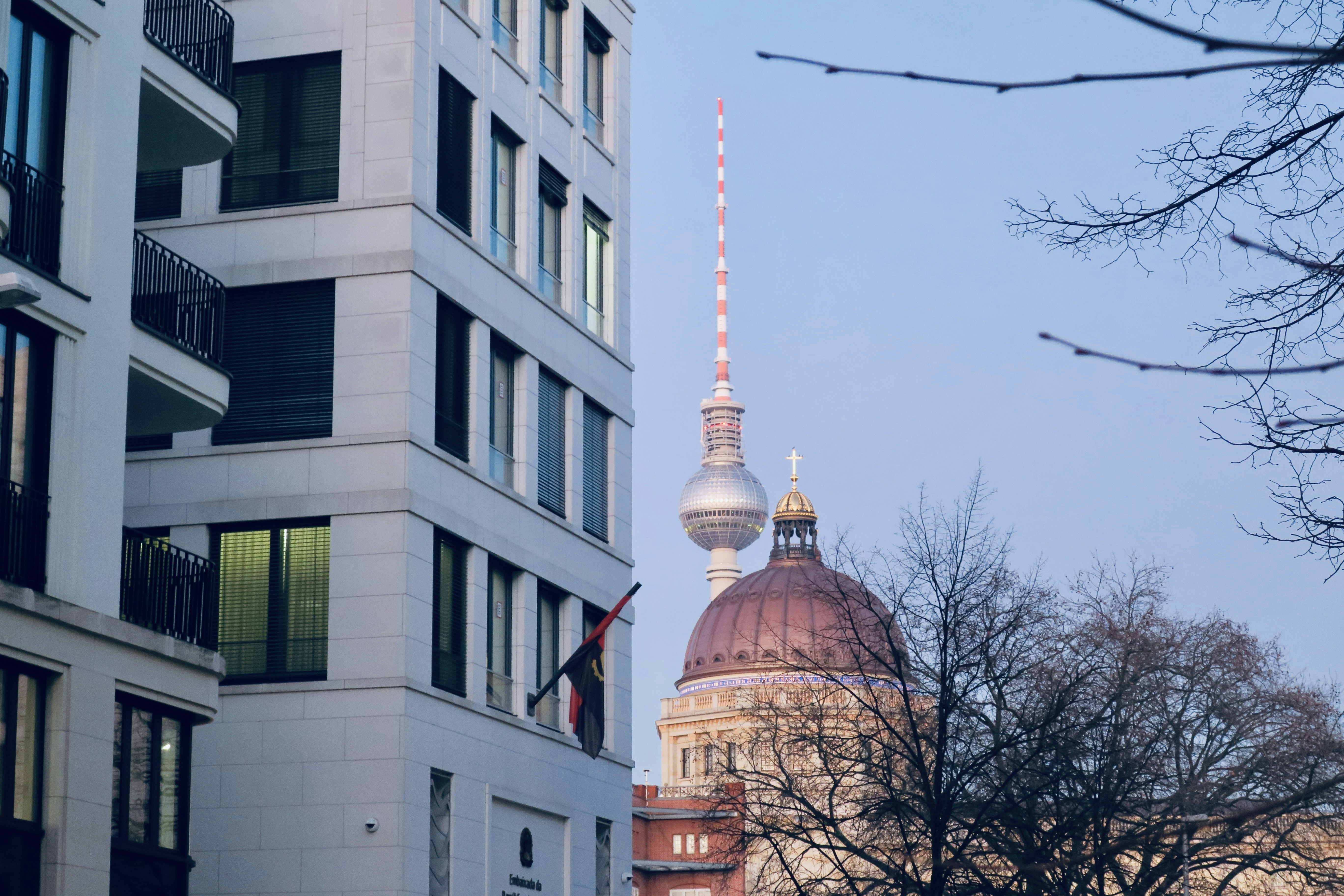 a tall building with a dome on top of it