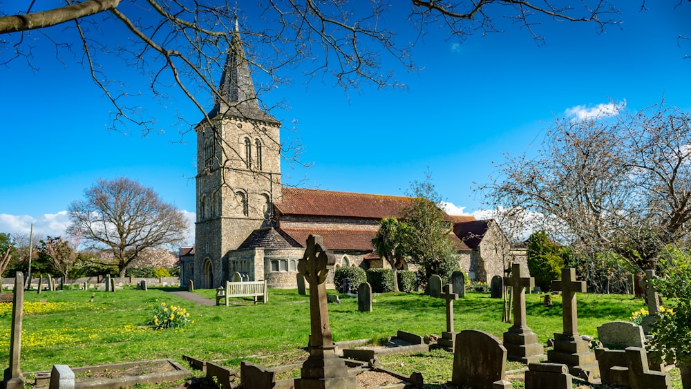 a cemetery with a church in the background