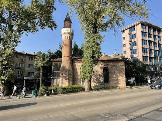 A tall brick building sitting on the side of a road — Bursa, Turkey