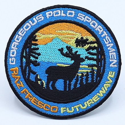 A round embroidered patch featuring a silhouette of a deer against a backdrop of mountains, trees, and a sunset or sunrise. The words 'Gorgeous Polo Sportsmen' adorn the top edge of the patch, while 'Raz Fresco Futurewave' runs along the bottom edge in colorful thread.