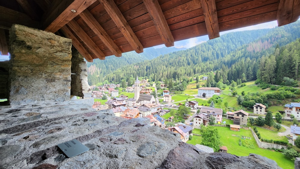 a view of a village from the top of a mountain