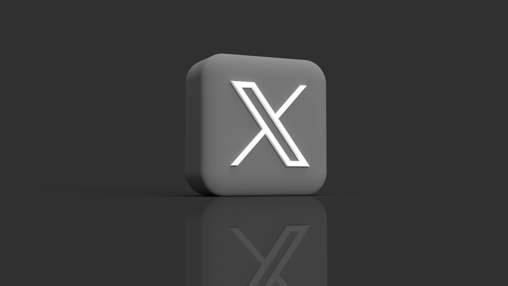 文字Xが書かれたコンピューターのキーボード