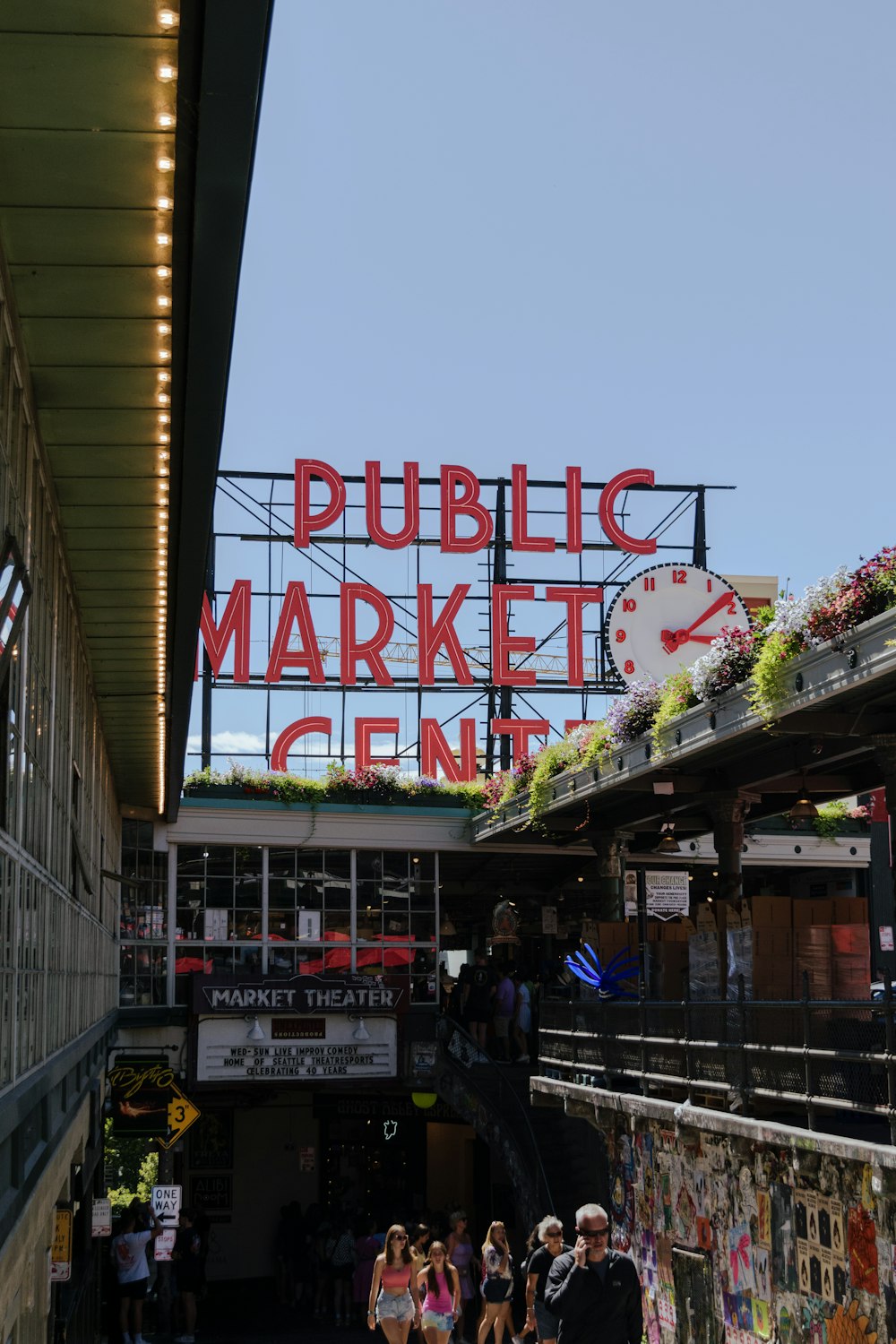 a public market with people walking around