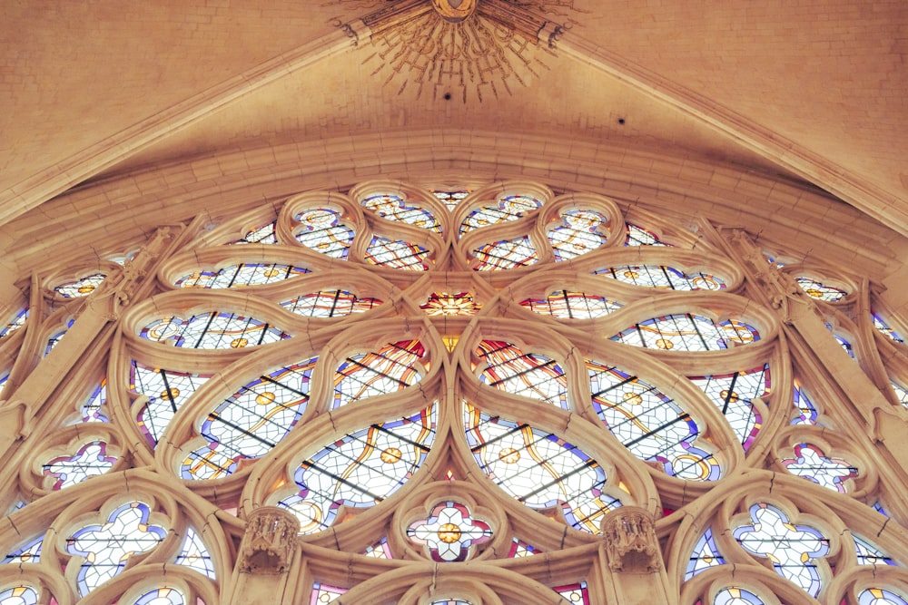 a large cathedral with a massive stained glass window