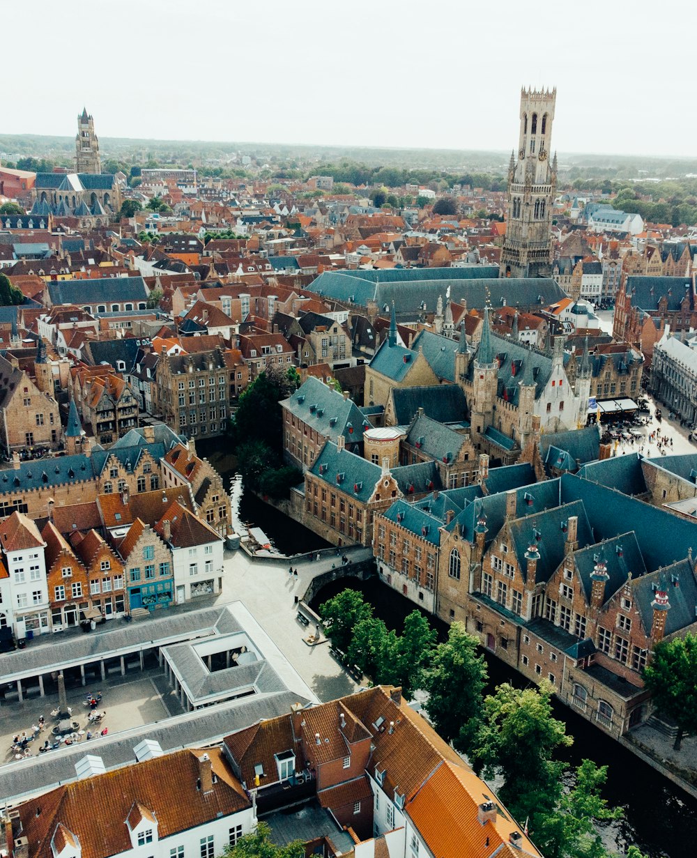 an aerial view of a city with a clock tower