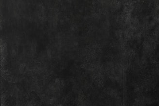 a black and white photo of a wall