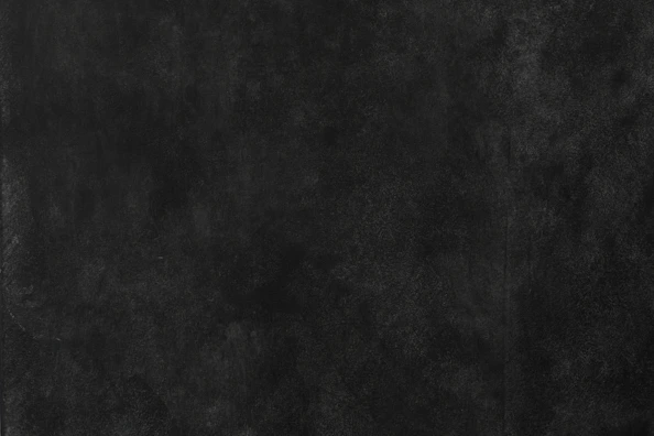 a black and white photo of a wall