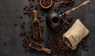 a table topped with lots of coffee beans