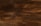 Dark wooden planks arranged horizontally with a textured surface, displaying a rich brown tone with subtle variations and natural grain patterns.