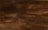 Dark wooden planks arranged horizontally with a textured surface, displaying a rich brown tone with subtle variations and natural grain patterns.
