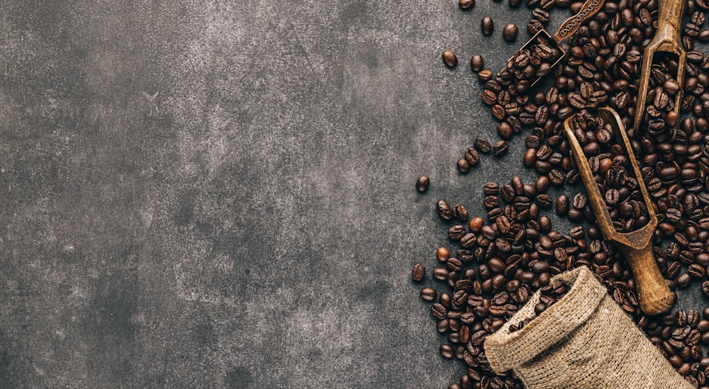 a sack of coffee beans next to a sack of coffee beans