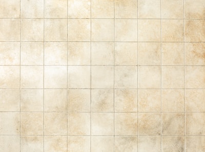 A selection of slate tiles in soft beige tones.