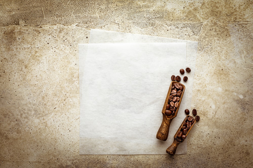 a piece of paper with some coffee beans on it