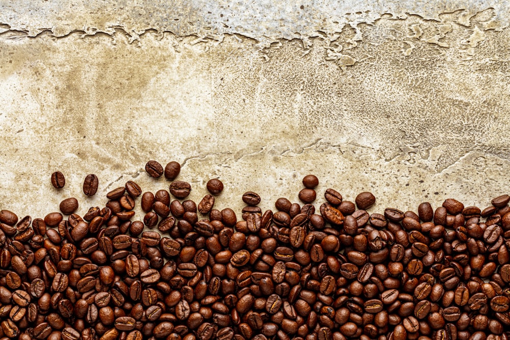 a group of coffee beans sitting on top of each other