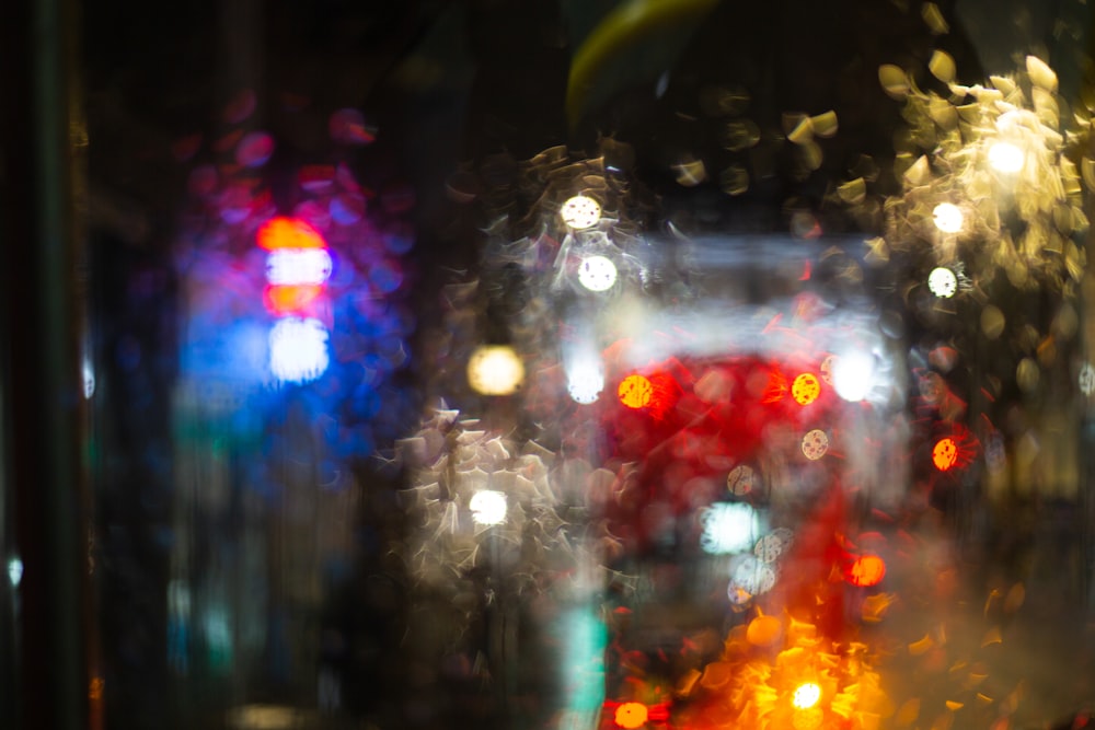 a blurry image of a city street at night