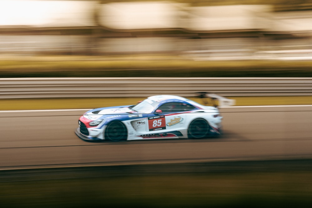 a racing car driving down a race track