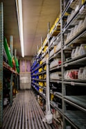 a room filled with lots of shelves filled with containers