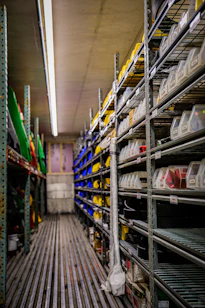 a room filled with lots of shelves filled with containers