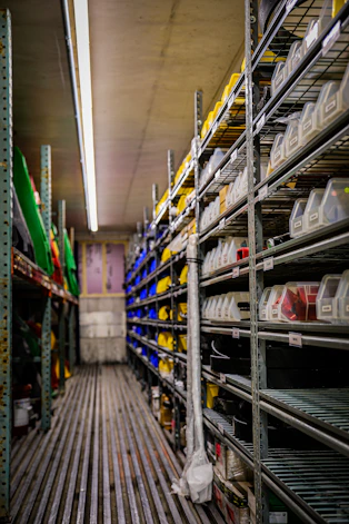a room filled with lots of shelves filled with containers