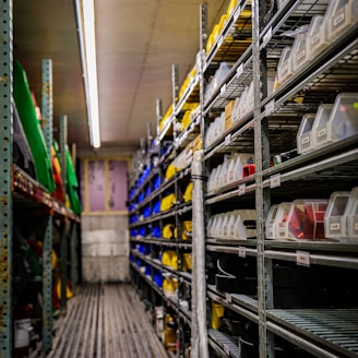 a room filled with lots of shelves filled with containers