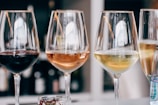 a group of wine glasses sitting on top of a table