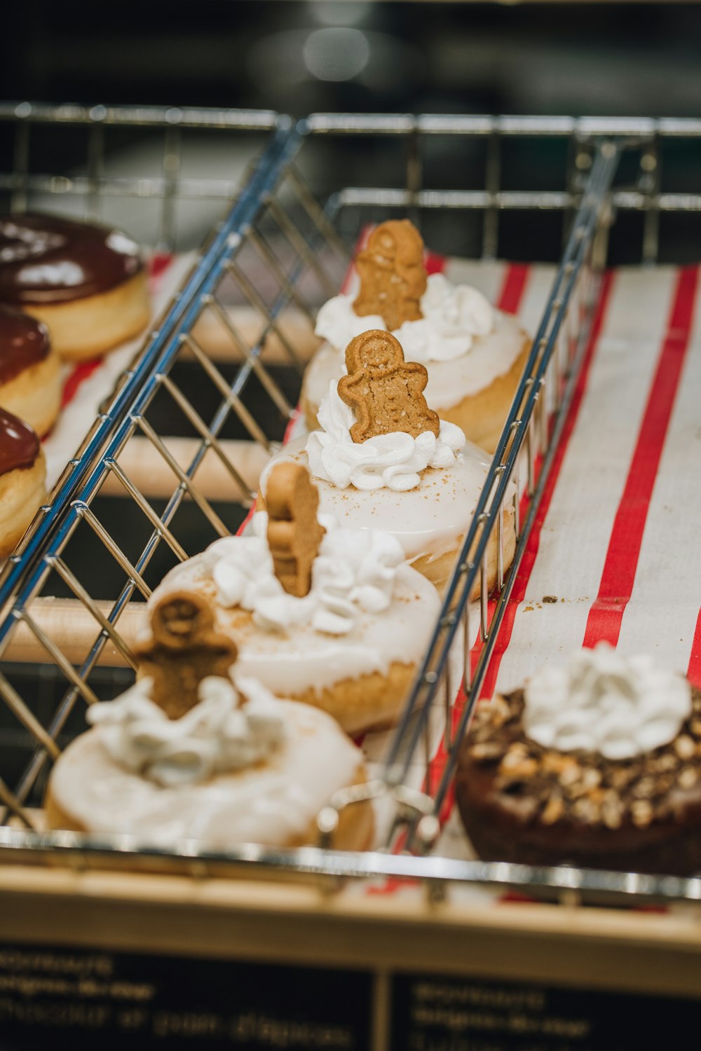 a bunch of doughnuts that are on a rack