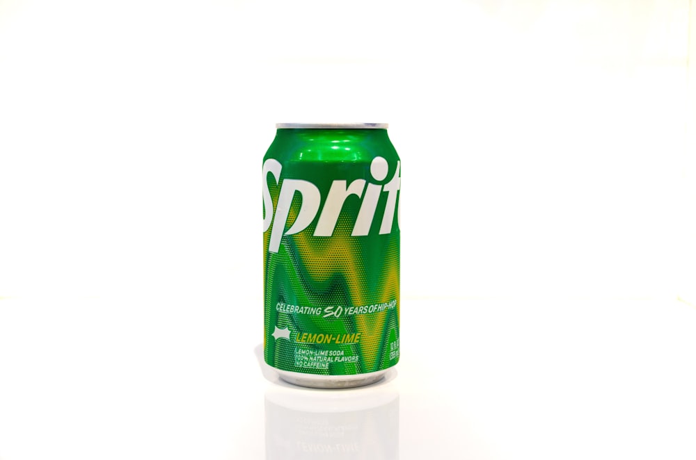 a can of sprite on a white surface