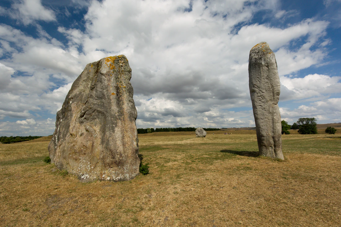Ancient standing stones at Avebury beneath an open sky