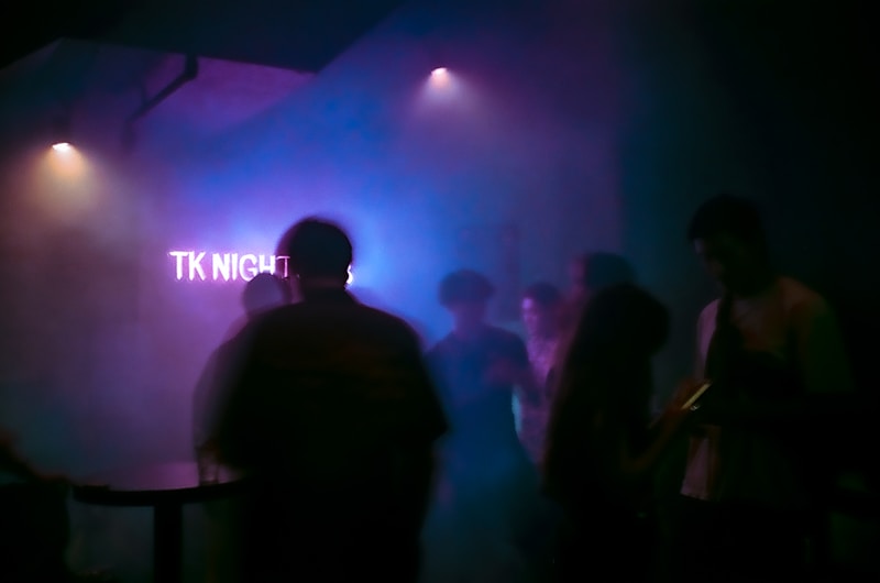 Group in dark club