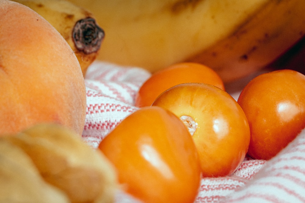a close up of a bunch of fruit on a cloth
