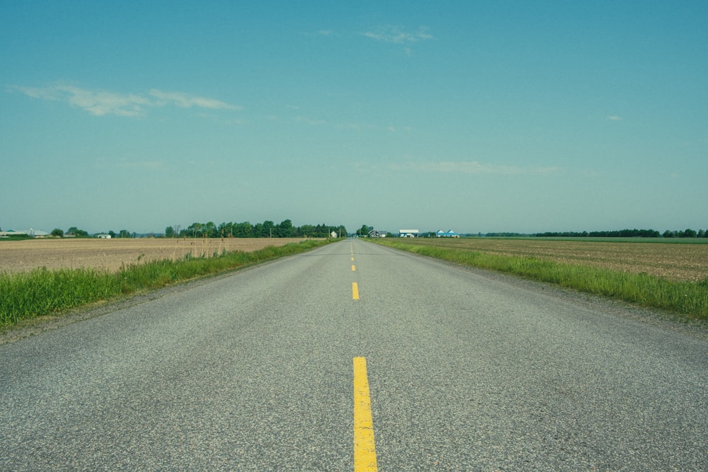 a road with a yellow line in the middle of it