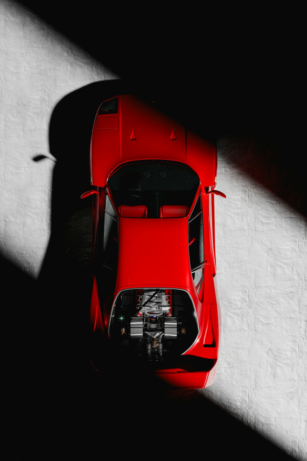 an overhead view of a red sports car