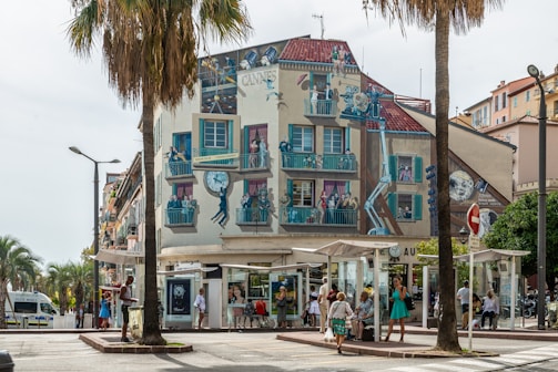 A colorful mural being filmed, celebrating local street artists.