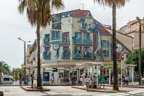 Photo of a vibrant Mumbai street with a film crew setting up cameras, capturing the city's lively film atmosphere.