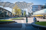Wide angle shot of the plaza's modern layout blending urban design and comfort
