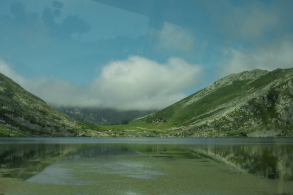 a large body of water surrounded by mountains