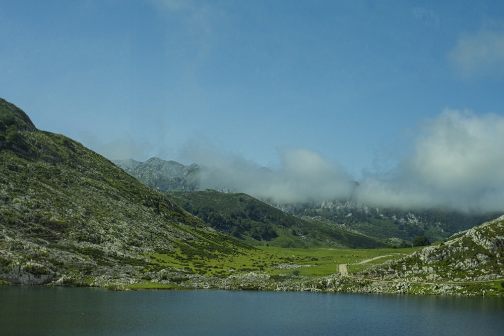 a large body of water surrounded by mountains