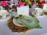 Close-up of a beautifully arranged table with personalized name cards and delicate decorations.