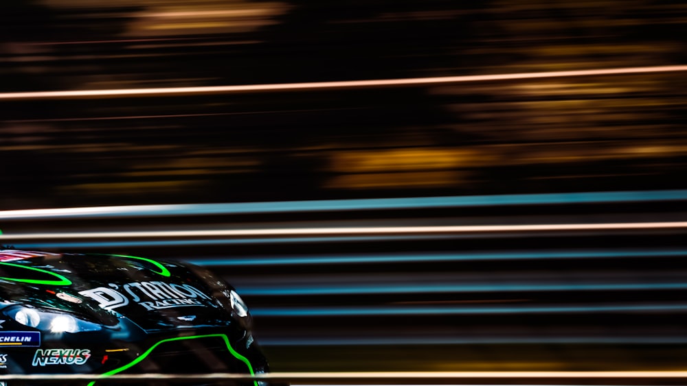 a man riding a motorcycle on top of a track