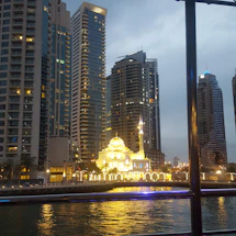 Elegant Algerian city skyline at dusk with modern buildings and soft lighting