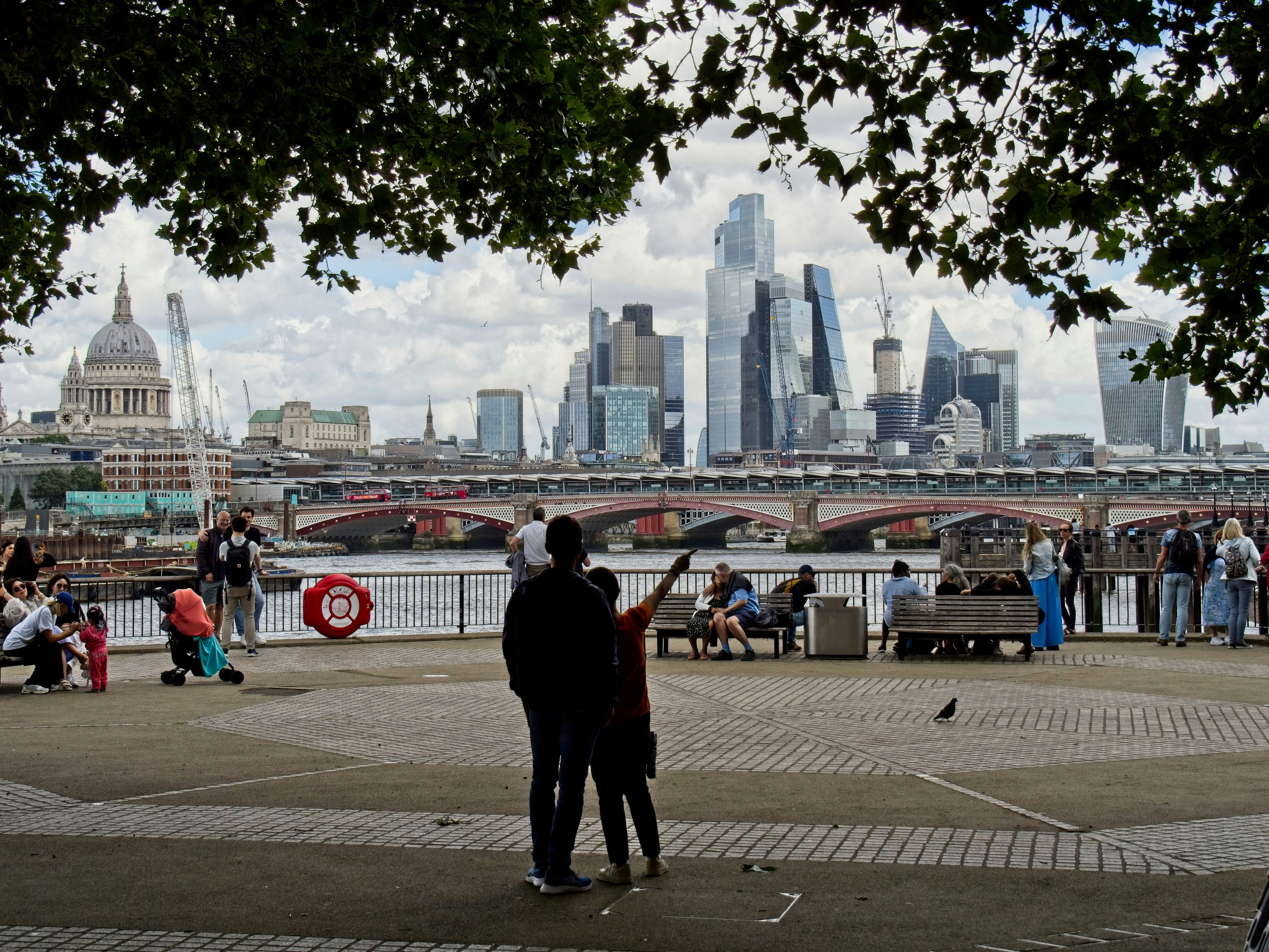 a couple of people standing next to each other