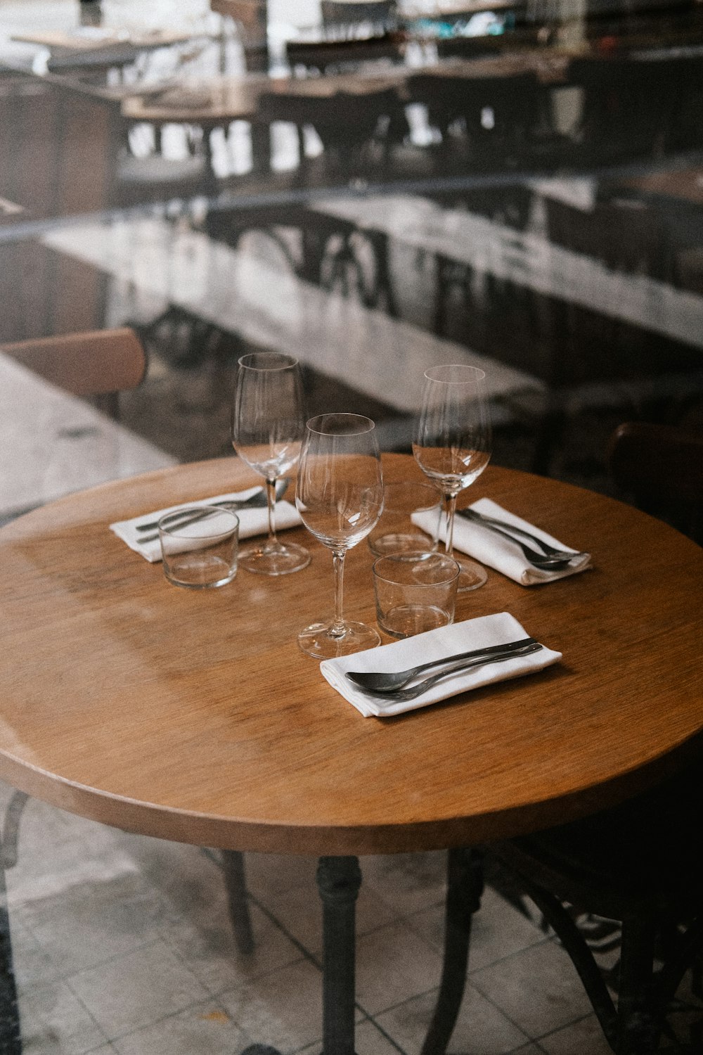 a table that has some wine glasses on it