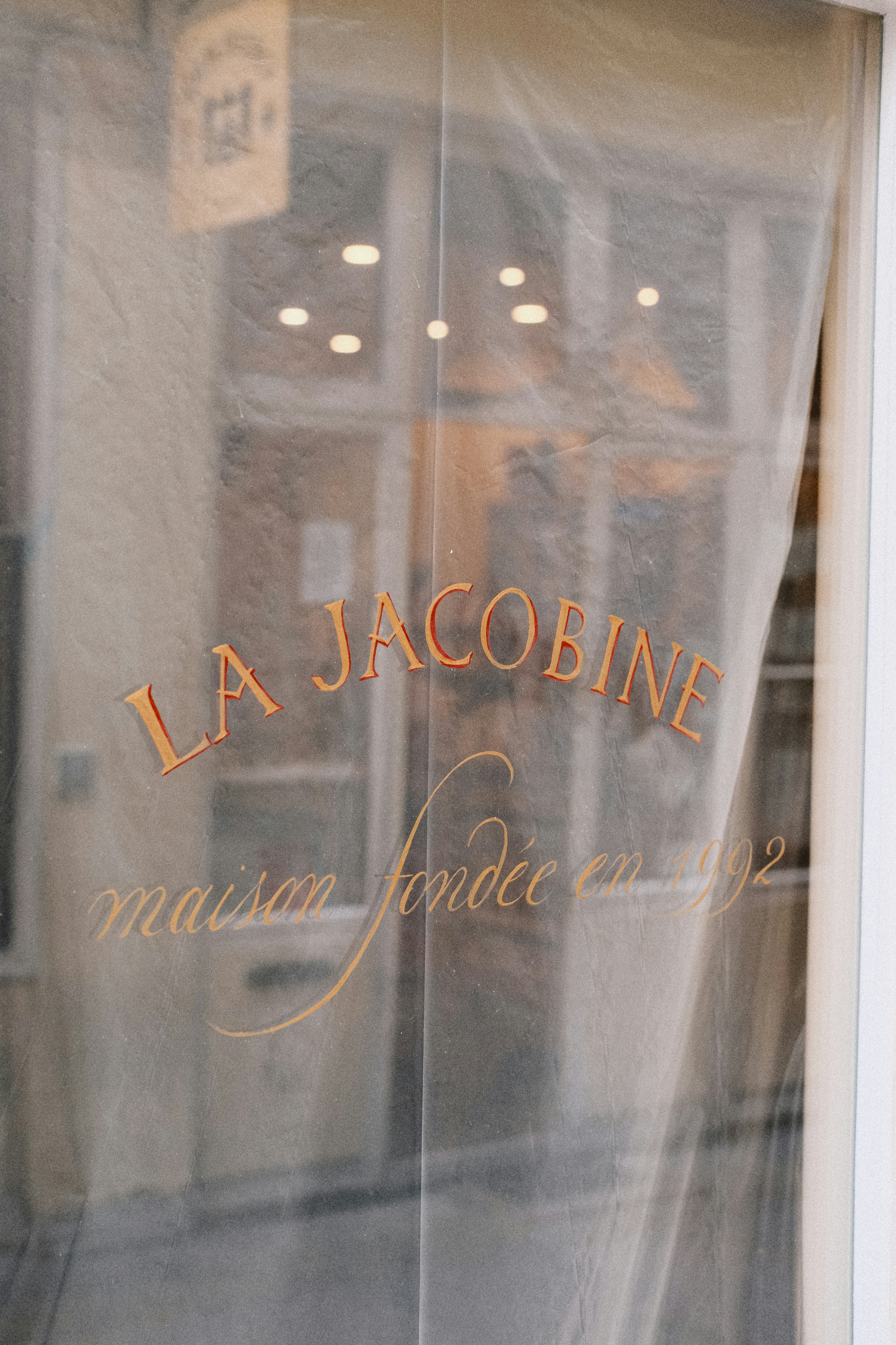 a close up of a window with a sign on it