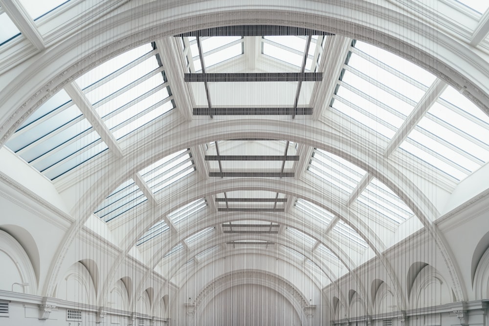a large white building with a skylight above it