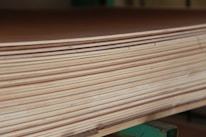A close-up of high-quality MDF sheets stacked neatly.