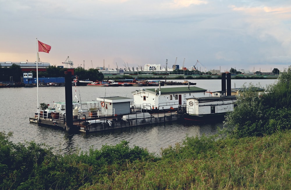 a boat docked at a dock in the water