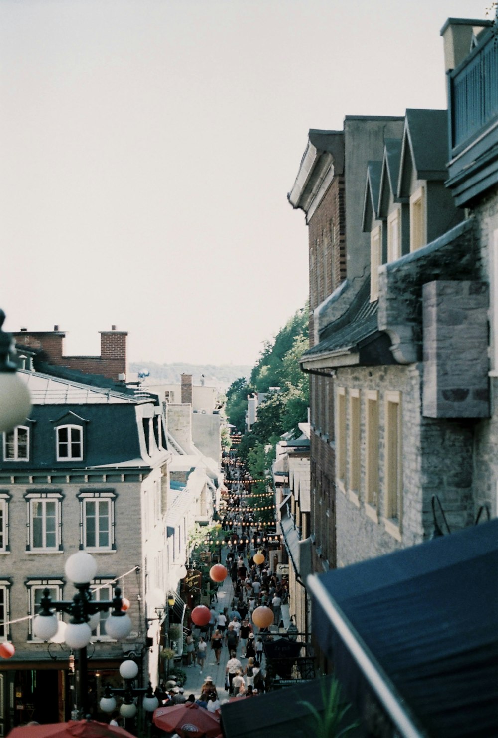 a city street filled with lots of tall buildings