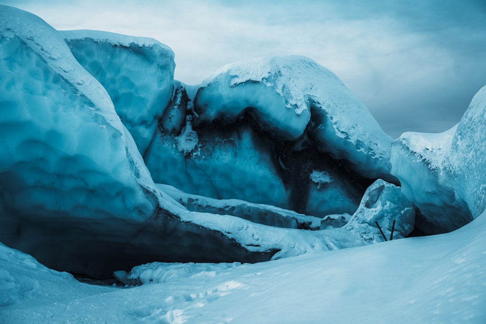 a group of ice formations in the snow