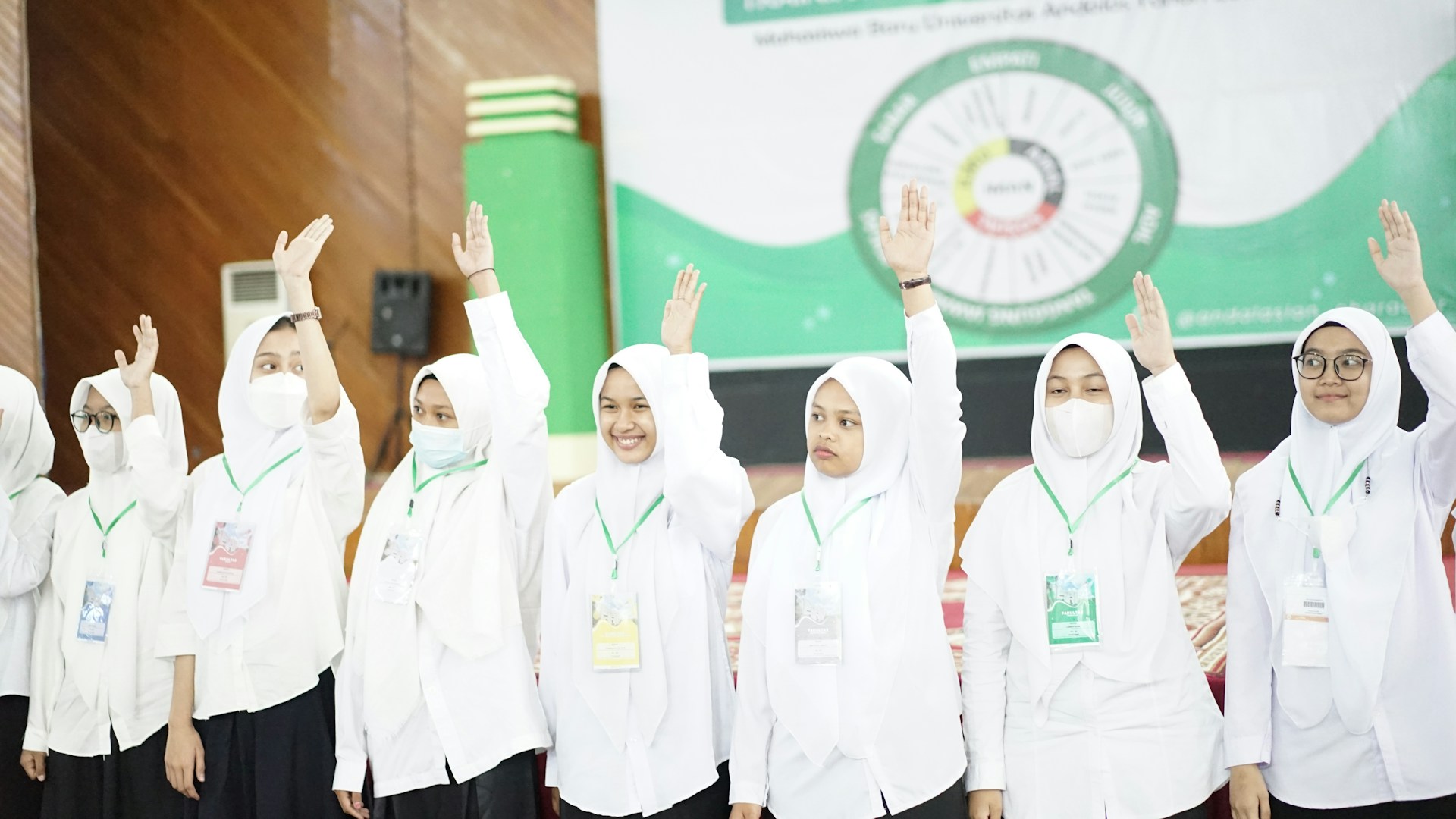 a group of young women standing next to each other
